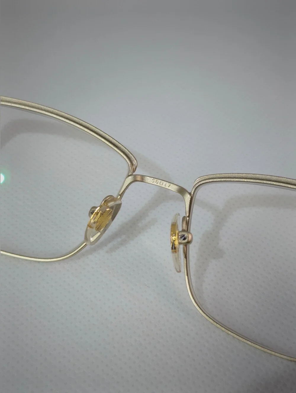 Vogue. Stylish Cat-Eye Metal Frame Glasses in Rose Gold Silk Texture.